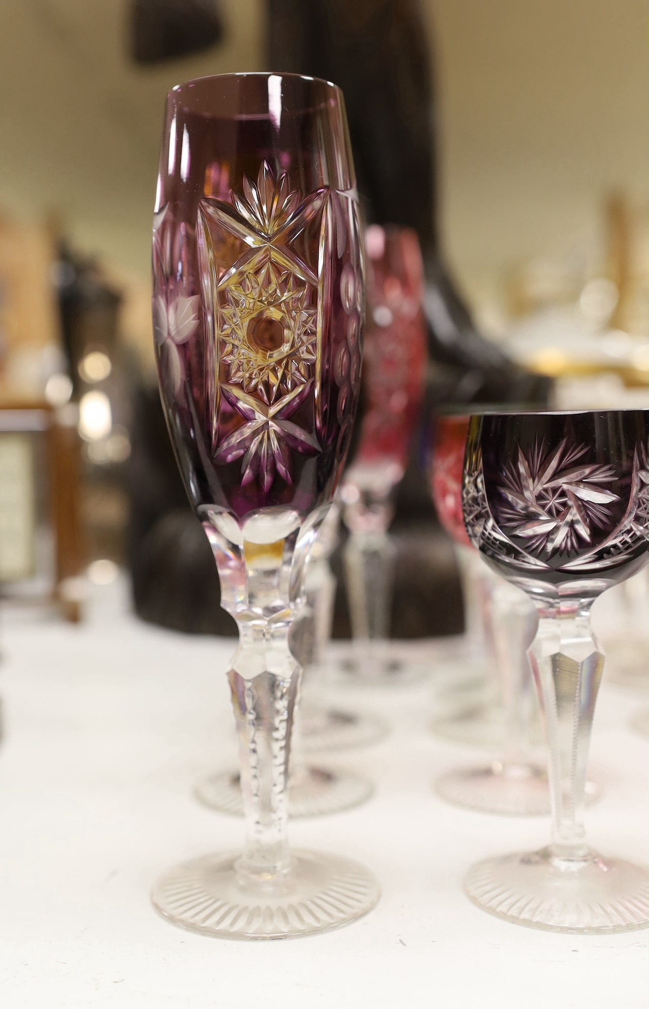 A group of mixed coloured bowl wine glasses